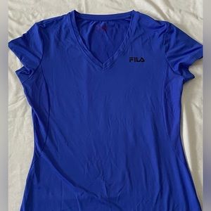 Gently used Women’s size Medium Fila Sport Workout tee.